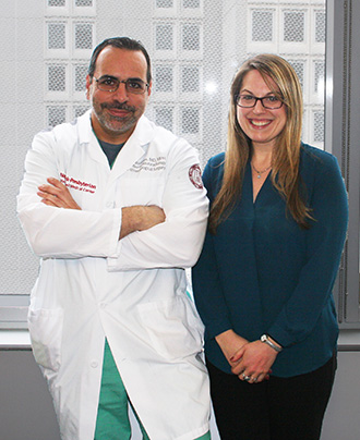 Dr. Athos Patsalides with tinnitus patient Kate Metzler