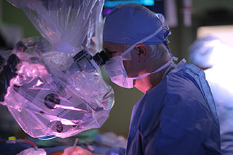 Dr. Phil Stieg, Chair of the Brain and Spine Center, in the operating room