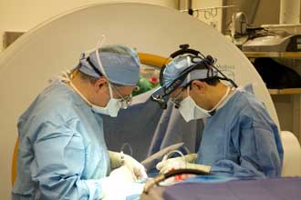 Dr Hartl uses advanced 3D intraoperative scanning and navigation to ensure precise placement of screws Dr Hartl uses advanced 3D intraoperative scanning and navigation to ensure precise placement of screws