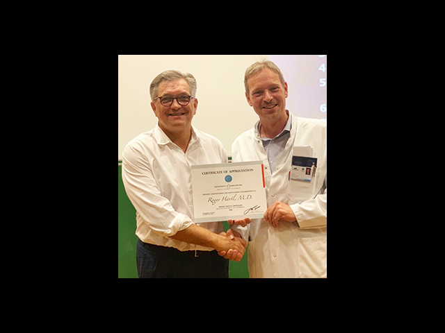 Dr. Roger Hartl and Dr. Claudius Thome