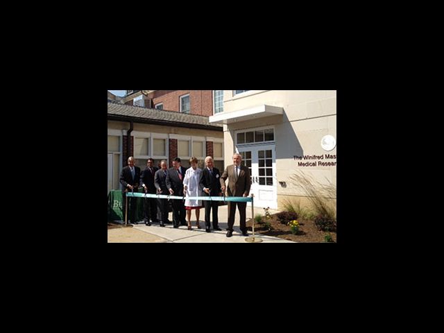 Dr. Philip E. Stieg, second from right, helps open the new Regenerative Medicine Laboratories at Burke Medical Research Institute.