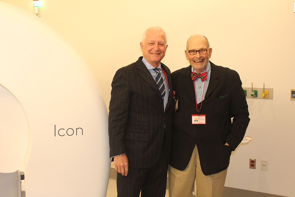 Dr. Philip Stieg, chair of neurosurgery, and Dr. Michael Apuzzo, a pioneer in radiosurgery